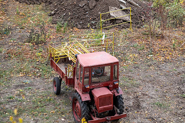 Children's tractor in a potato field