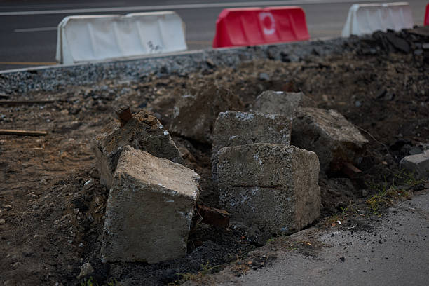 istock Construction Site Featuring Exposed Blocks and Safety Barriers All Around the Area 2231089114