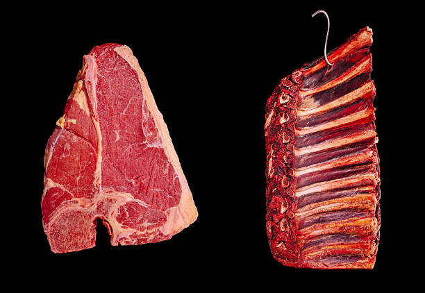istock Various cuts of beef showcased on a black background for culinary display 2231099754