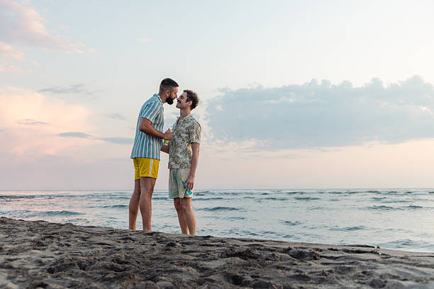 istock Two men enjoying a romantic moment together at the seaside 2231100232