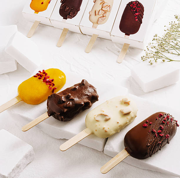 istock Assorted frozen desserts displayed on a white background in a kitchen setting 2231100258