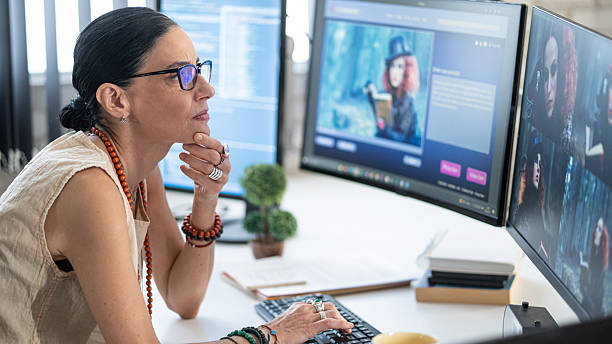 istock Senior female website designer, generates an image with artificial intelligence and creates a prompt 2231102735