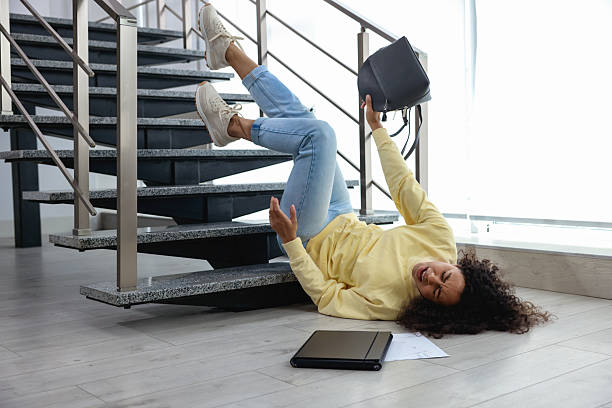 istock Woman falling on stairs in building. Dangerous accident 2231103543