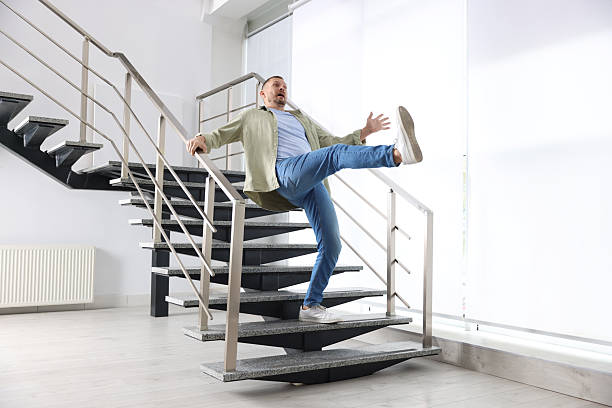 istock Man falling on stairs in building. Dangerous accident 2231103602