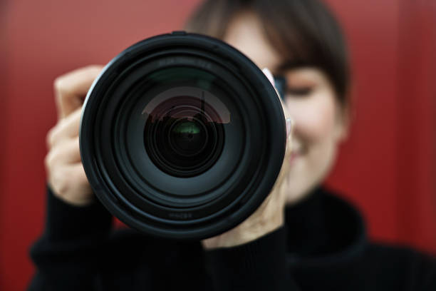 istock Professional photographer taking picture with camera outdoors, selective focus 2231104181