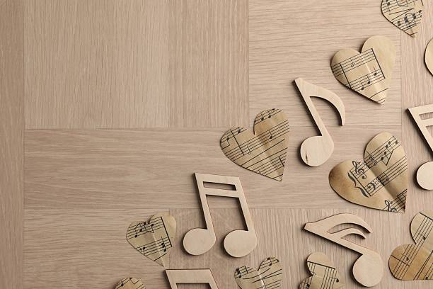 istock Paper hearts and notes on wooden table, flat lay. Space for text 2231108915