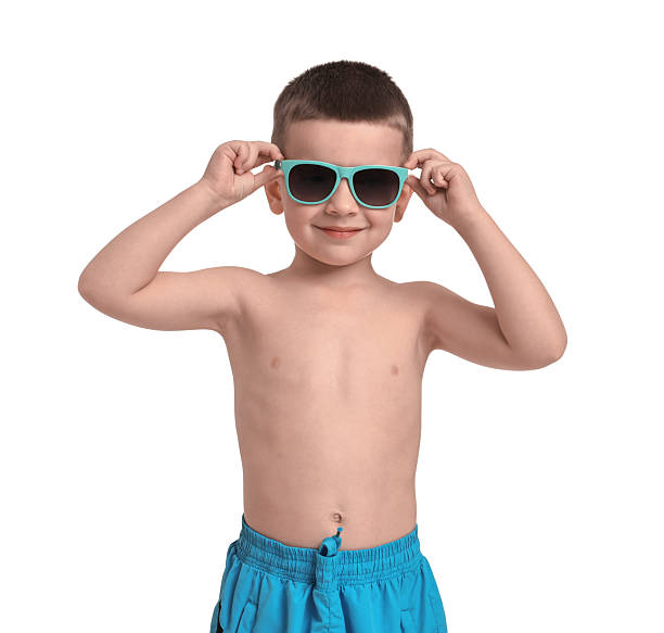istock Cute little boy in beachwear on white background 2231109271