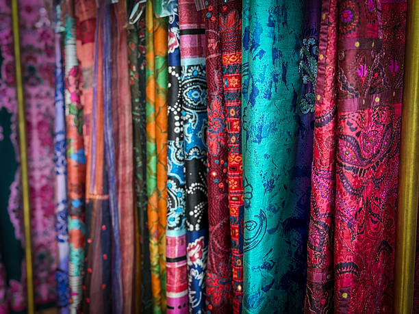 istock Close-up view of vibrant silk sarees with intricate patterns. Silk Saree Patterns and Colors 2231111620