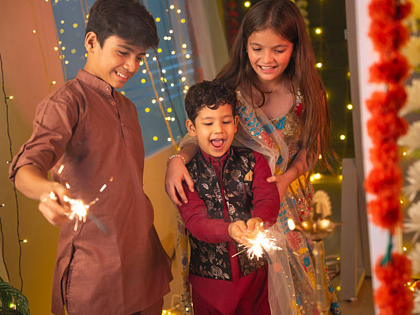 istock Friends enjoying with sparklers at home during Diwali 2231118436
