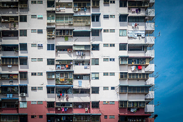 Façade of a old rustic low cost residential buildings in Penang Island.