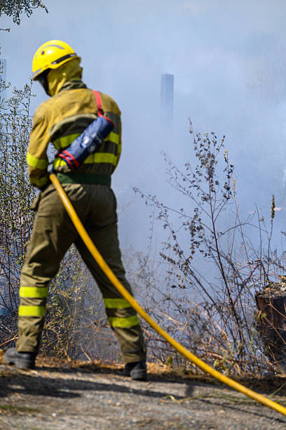 istock The Back of a Firefighter in Full Protective Gear. Concept The anonymous protector. 2231132479