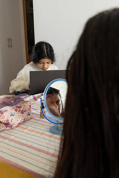 istock Teen Applying Makeup at Home 2231135013