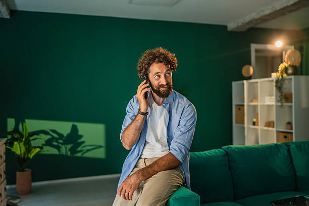 istock Entrepreneur talking on smart phone at home office 2231135116