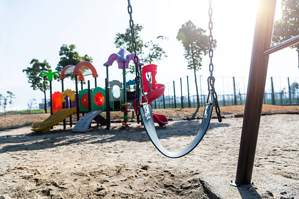 Outdoor children playground with swing