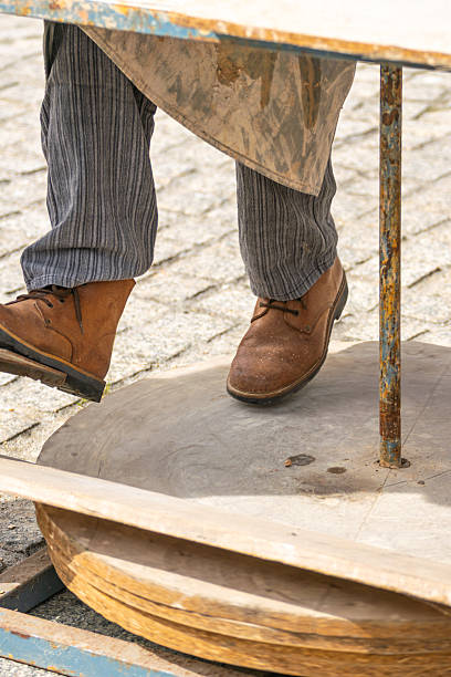 istock A craftsman using his feet to power a potter's wheel in a workshop handmade process concept 2231137261