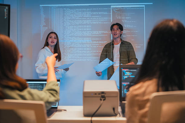istock Our vibrant programmer team brainstorm discuss at night to discuss project goals and various strategic innovations. We actively reviewed code, focusing on the development of vital systems vision 2231144165