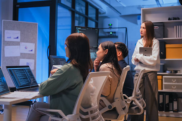 istock business meeting brainstorm at nightour programmer highlighted how AI and automation will drive the company's digital transformation, enabling a hybrid workforce to achieve greater efficiency 2231144319
