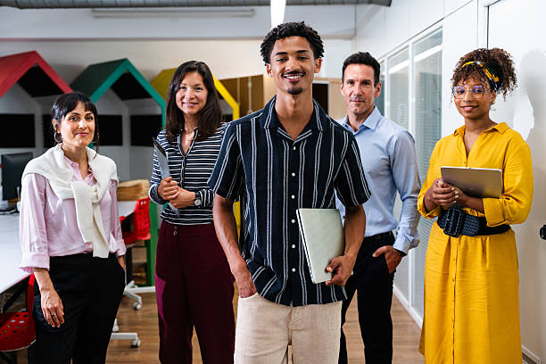 istock Startup business team posing in modern office: diverse colleagues collaborating on project 2231146029