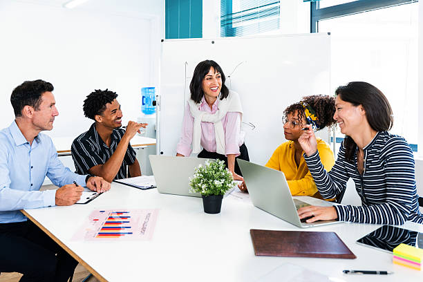 istock Business people collaborating during meeting in modern office 2231150427