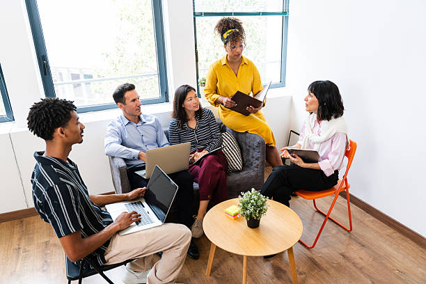 istock Business people collaborating during meeting in modern office 2231151228