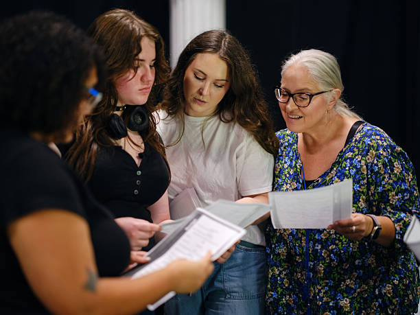 istock Community Theater Group Rehearsing a Play 2231151977
