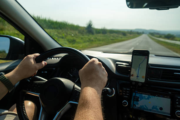 istock Driving with GPS Navigation on a Rural Road 2231154098