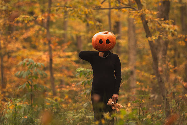 It was an autumn in Germany. The sunshine was mildly spreading on the boy and the pumpkins.
