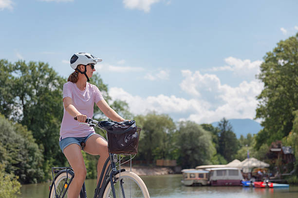 istock Biker enjoying summer day by the riverbank 2231158391