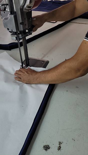 istock Small Business owner checking the fabric for the last time 2231160441