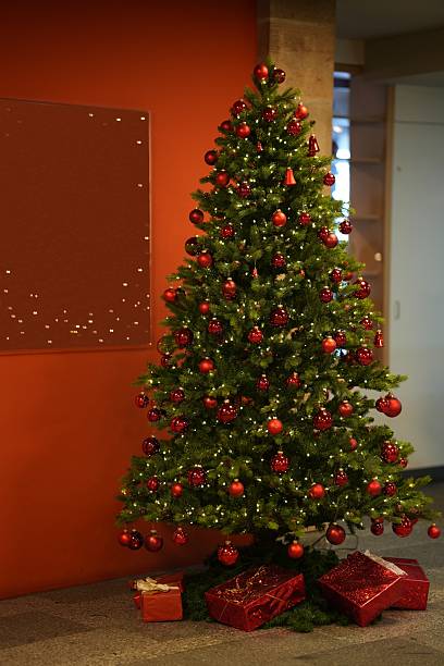 istock Christmas tree decorated with red glass balls 2231160836