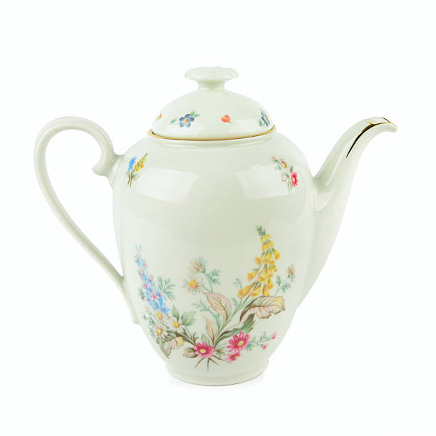 istock Vintage Teapot with Floral Design isolated on white background. 2231161212