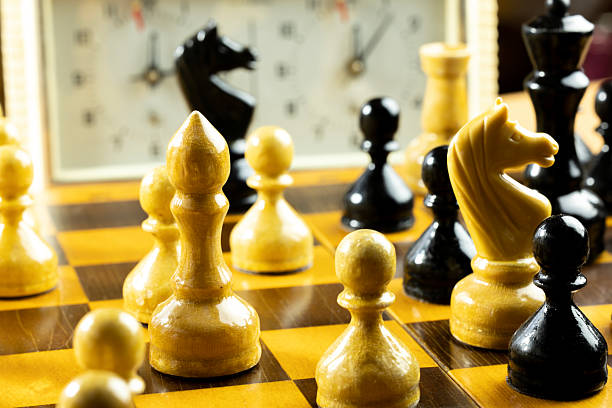 istock A close-up view of a chessboard with black and white pieces. 2231164465
