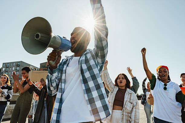 istock Diverse group of activists rallying together with determination and unity 2231164553