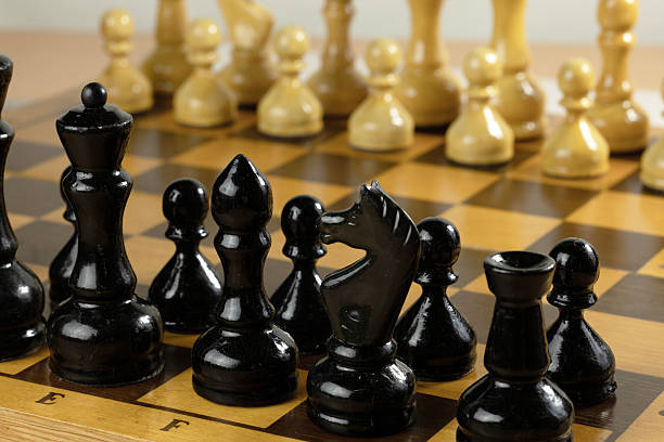 istock A close-up view of a chessboard with black and white pieces. 2231164624