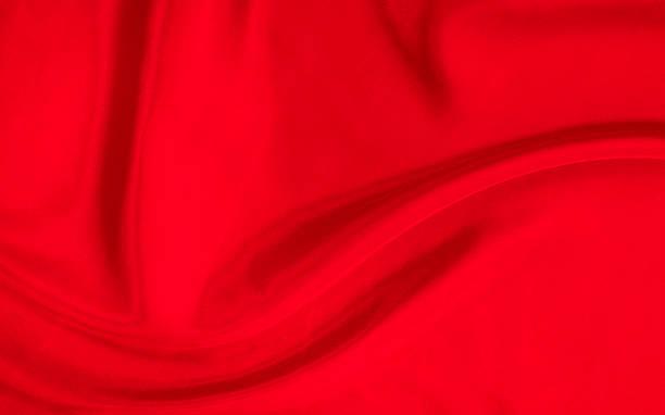 istock Black red satin dark fabric texture luxurious shiny that is abstract silk cloth background with patterns soft waves blur beautiful. 2231166281