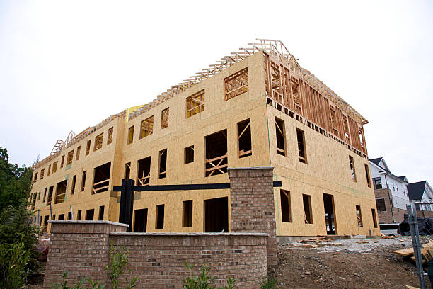Mass Timber Construction, new apartment complex under construction in a suburban setting.