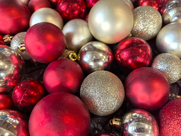 istock Holiday ornaments in vibrant red and silver create a festive arrangement 2231174698