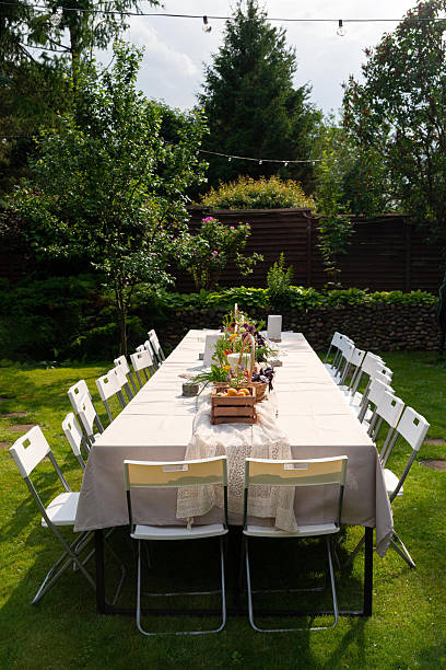 istock Garden party table setup with chairs 2231175223