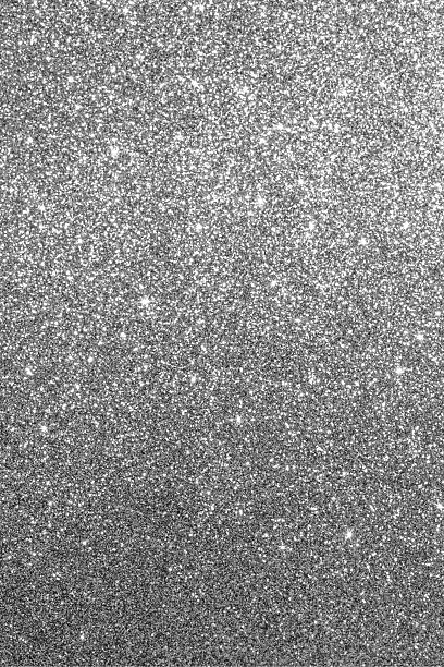istock Silver glitter texture with sparkling metallic highlights and shiny reflective elements 2231181517