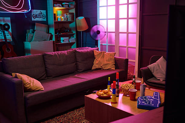 istock Empty Living Room Showing Table with Snacks and Drinks during Party Night 2231183040