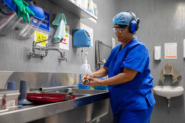 istock Nurse cleaning and sterilising surgical tools 2231183623