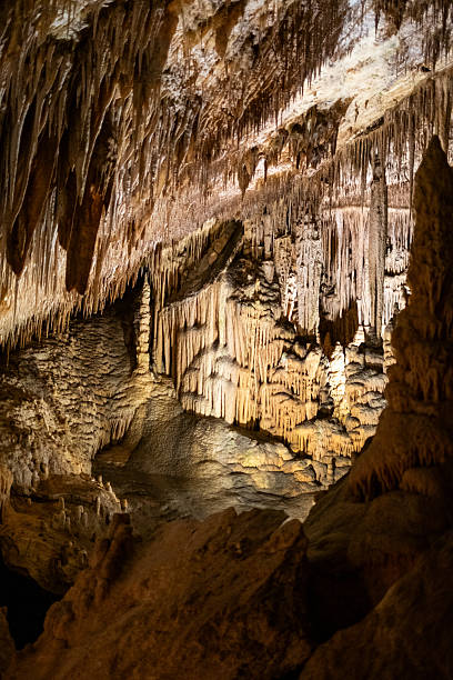 istock Stunning stalactites and stalagmites in mysterious underground cave 2231185327