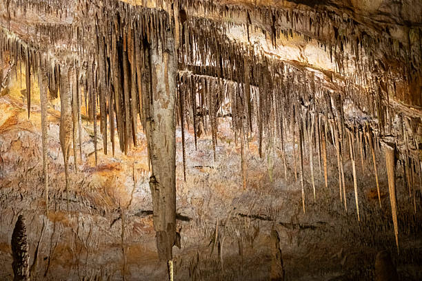 istock Magnificent stalactites and stalagmites in a mysterious underground cave 2231185375
