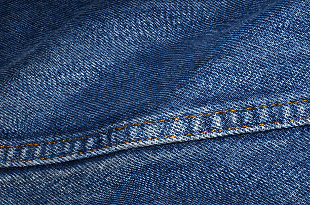 istock A section of blue denim jeans 2231190094