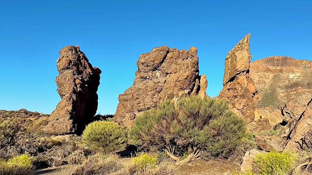 istock Stunning and Majestic Rock Formations Towering Against the Bright Blue Sky Above Them 2231202829