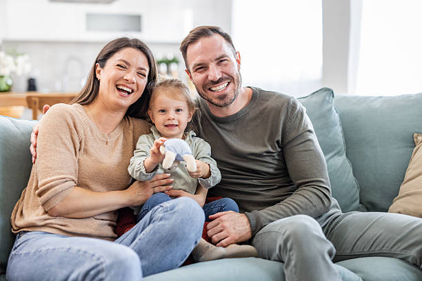 istock Happy family smiling and having fun at home 2231204000