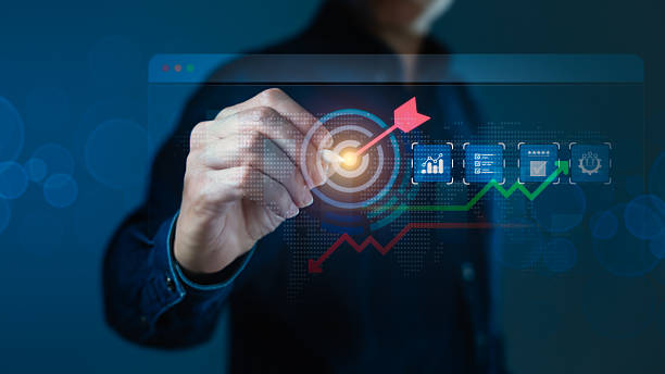 istock Businessperson Achieving Goals on Digital Interface with Target and Growth Charts 2231209740