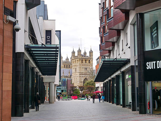 Exeter, Devon, England, United Kingdom - March 6, 2023.Princesshay shopping centre with Exeter Cathedral in the distance in Exeter, Devon, England, United Kingdom.