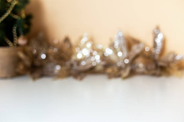 Christmas background. Blurred festive decorations featuring shimmering lights and soft textures create warm and inviting holiday atmosphere, enhancing seasonal spirit and joy of celebration
