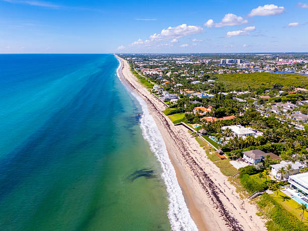 istock Ocean Ridge Florida summer beach scene with beachfront homes 2231214035